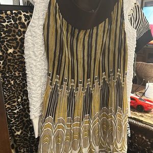 Ashley Stewarts.  sleeveless blouse.   brown white and yellow.size12w